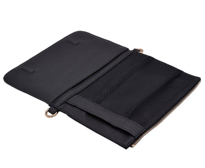 Black nappy changing clutch detached from changing mat. Shows wipes and nappy pockets. Features gold hardware
