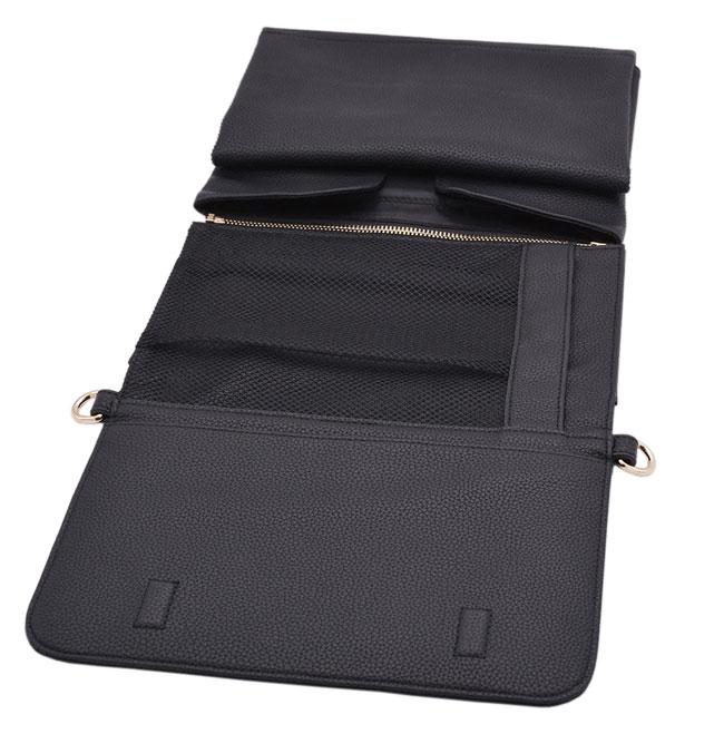 Black Indigo Nappy Changing Clutch folded out to show wipes pocket and nappy pocket. Features gold hardware.